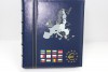 Альбом Оптима для 12 полных курсовых наборов новых стран Евро, красочные картонные листы надежно сохранят Вашу коллекцию. 2 том. Наружный формат  245х270х55мм. Германия. - Мир монет