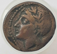 Драхма 300 год  до нашей эры.  Минойское царство на  острове Крит. Портрет богини Афины, бронза, вес 2,2гр, диаметр  15 мм, состояние XF-UNC. - Мир монет