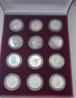 Набор 2х-рублевых знаков зодиака в футляре,  серебро, в каждой монете пол-унции чистого, пруф. - Мир монет