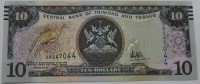 Банкнота 10 долларов 2006г. Тринидад и Тобаго, состояние  UNC, с полосками для слепых. - Мир монет