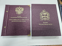 Альбом Албо Нумизматика  в шубере кожзам "Российская и советская мультипликация", б/у в отличном сотоянии, один раз были вставлены монеты. - Мир монет