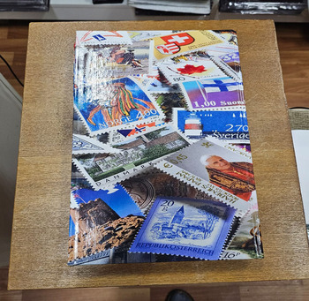 Альбом для марок LS 4/16  б\у, твердый переплет,  16 листов,32 страницы, формат А4.  Leuchtturm. Германия. - Мир монет